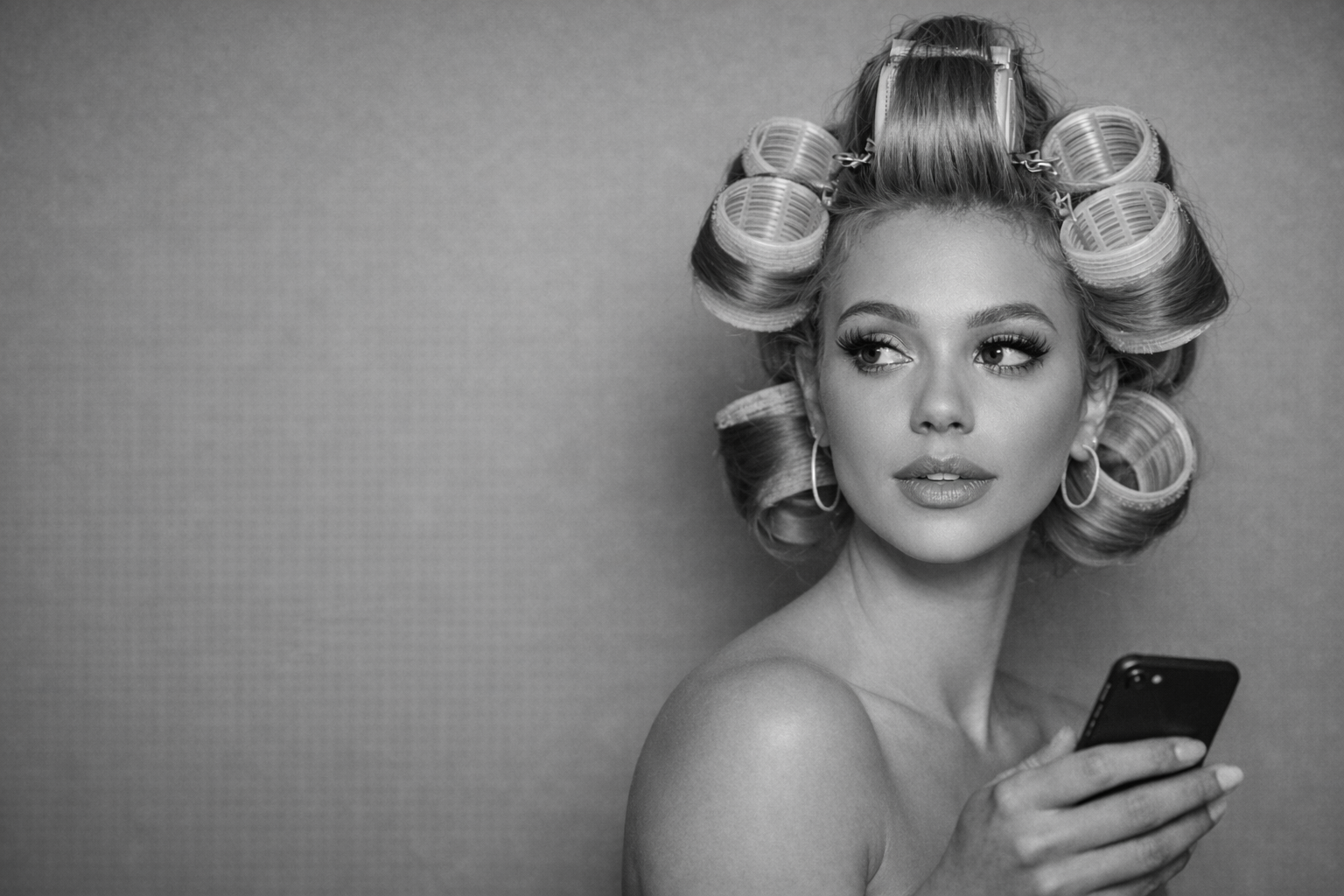Woman with hair rollers