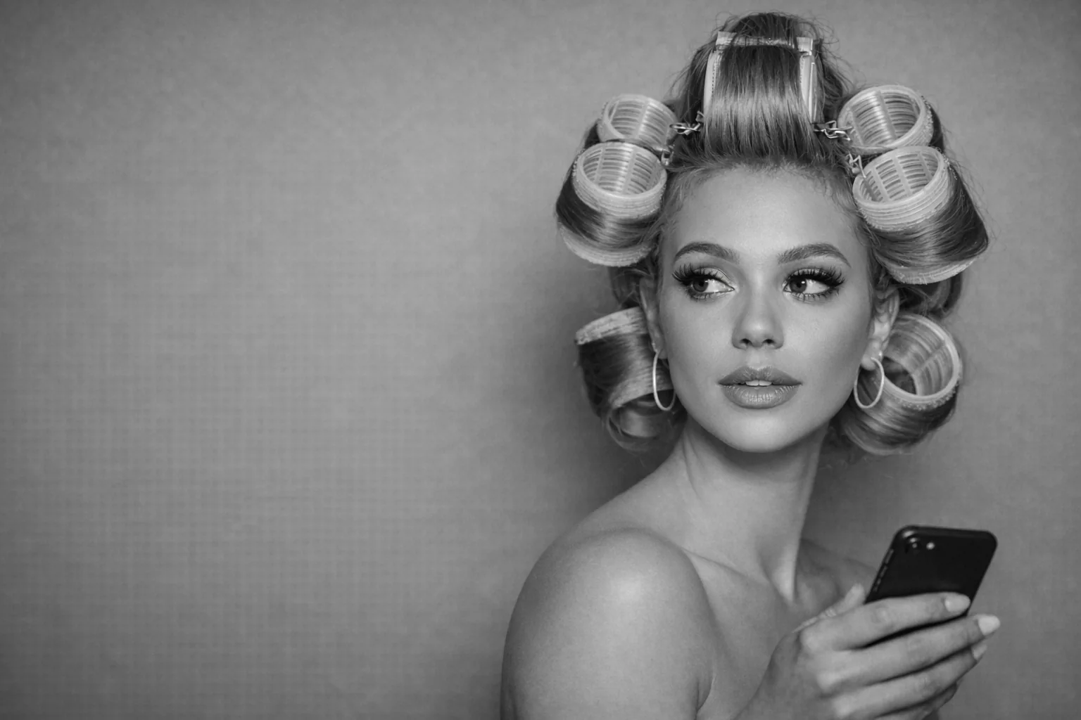 Woman with hair rollers